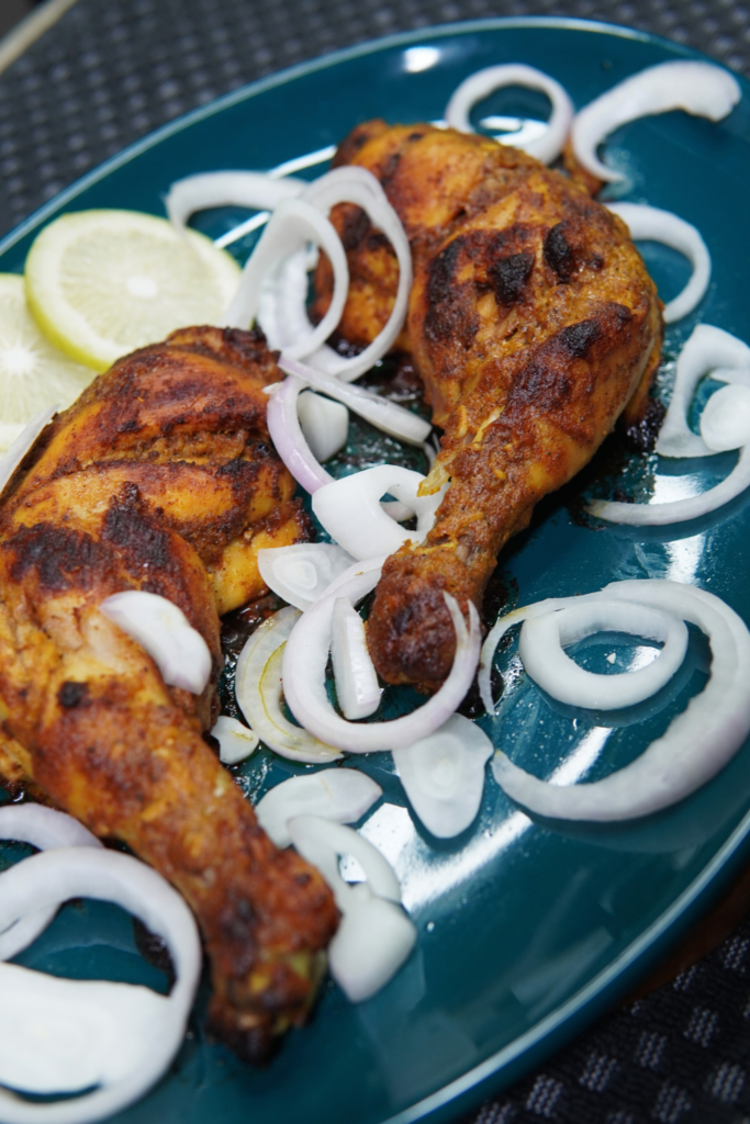 Serving the Tandoori Chicken