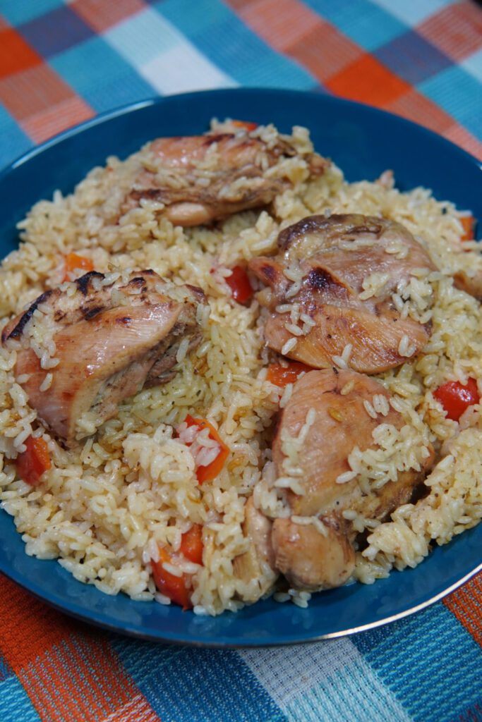 Serving the Caribbean Jerk Chicken and Rice